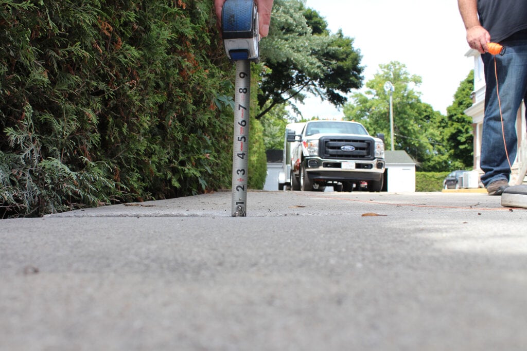 Residential Driveway with Sinking Concrete Raised